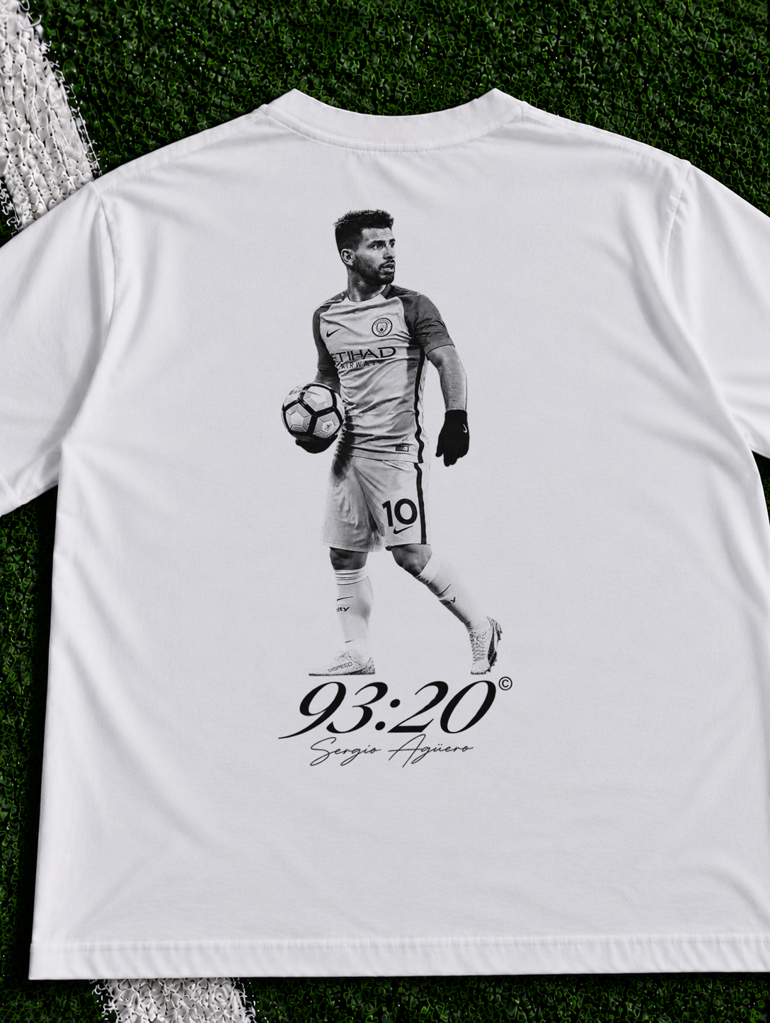 Sergio Aguero 93:20 organic heavy graphic T-shirt on football pitch zoomed in