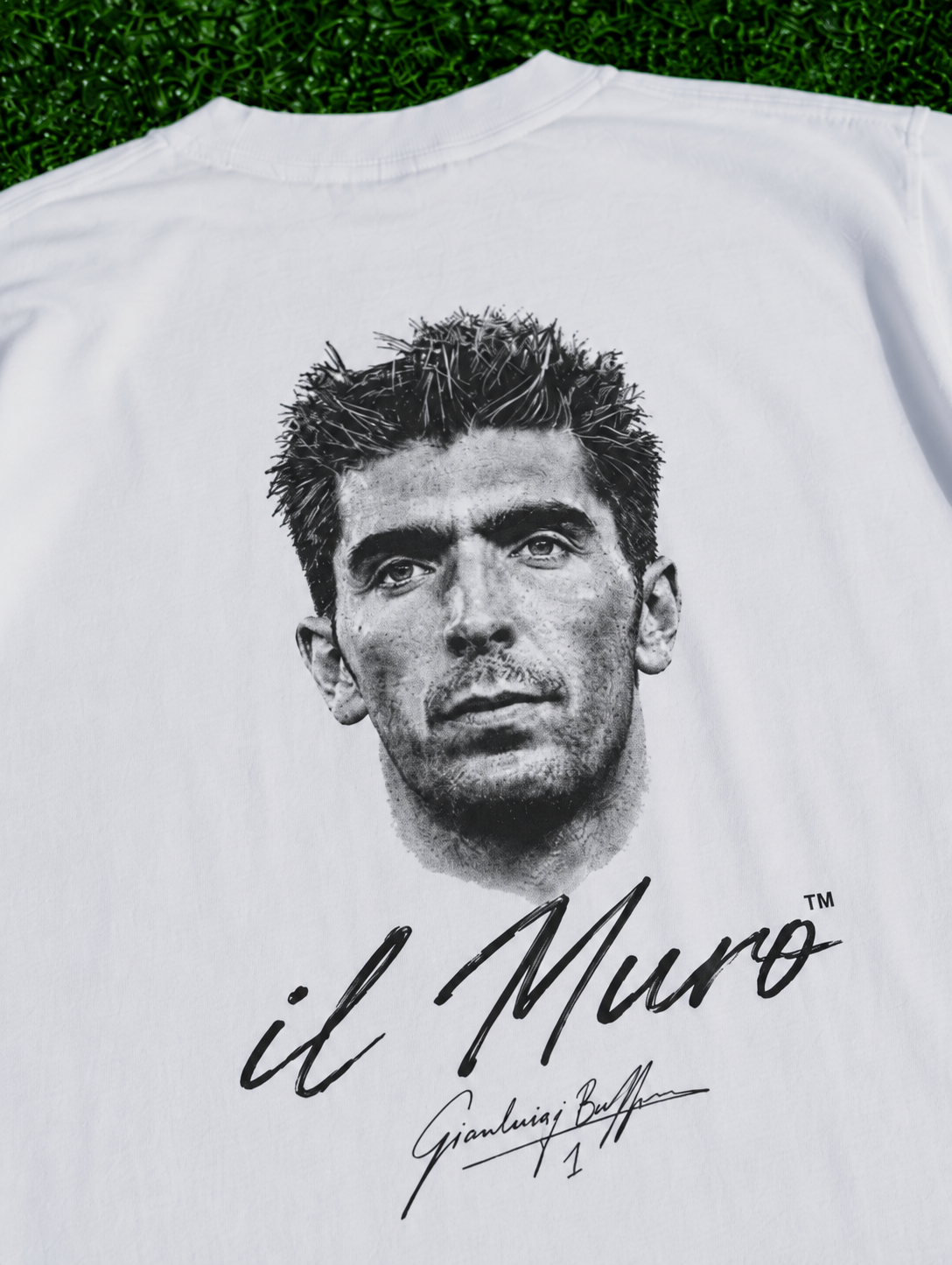Gianluigi Buffon Il Muro organic heavy white football T-shirt on a football pitch zoomed in