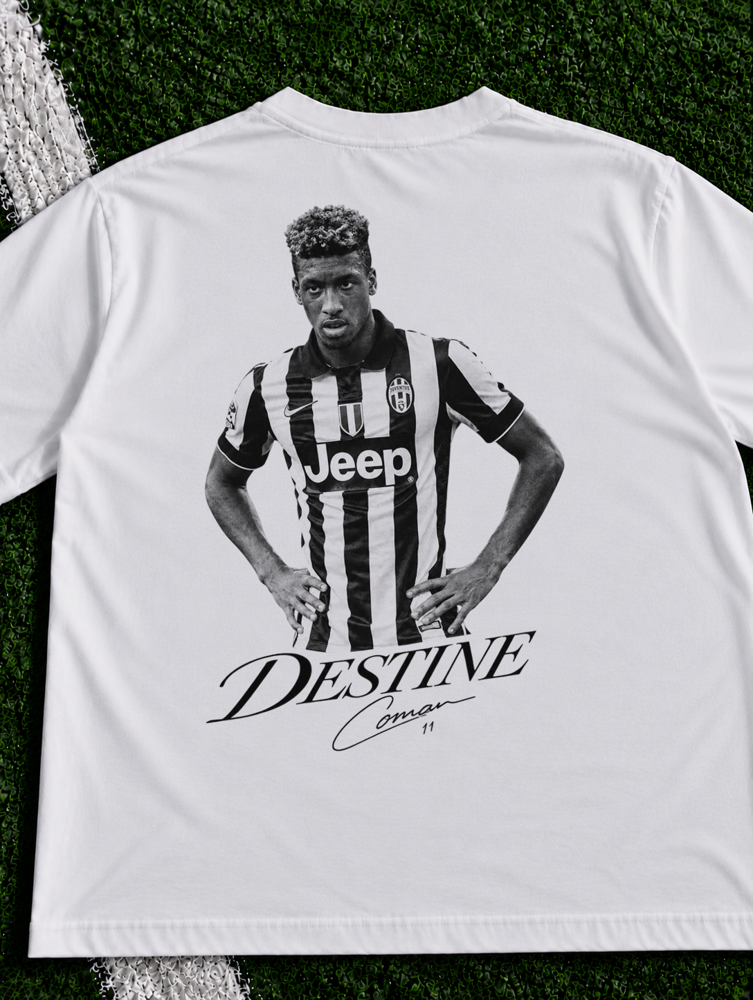 Kingsley Coman Destine organic heavy graphic T-shirt on football pitch zoomed in