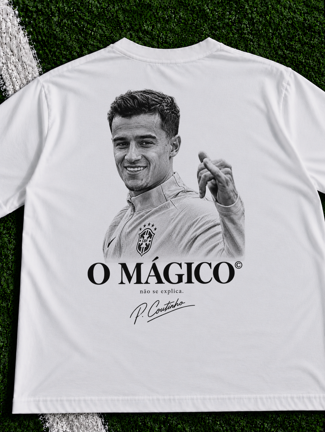 Philippe Coutinho O Magico organic heavy graphic T-shirt on football pitch zoomed in