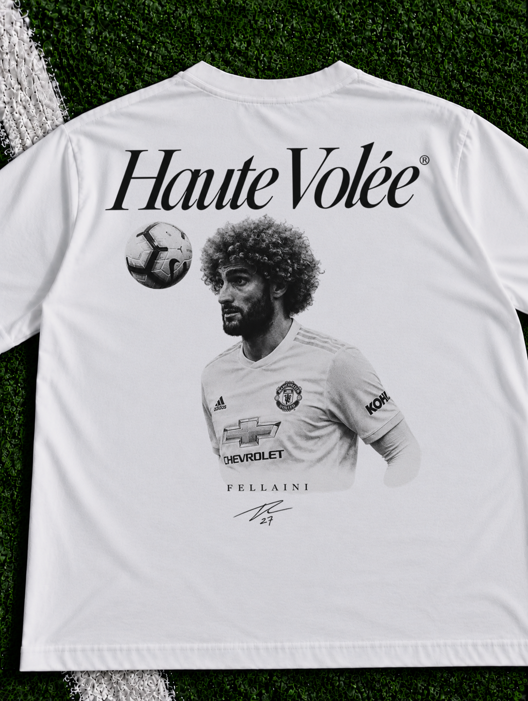 Marouane Fellaini Haute Volee organic heavy graphic T-shirt on football pitch zoomed in
