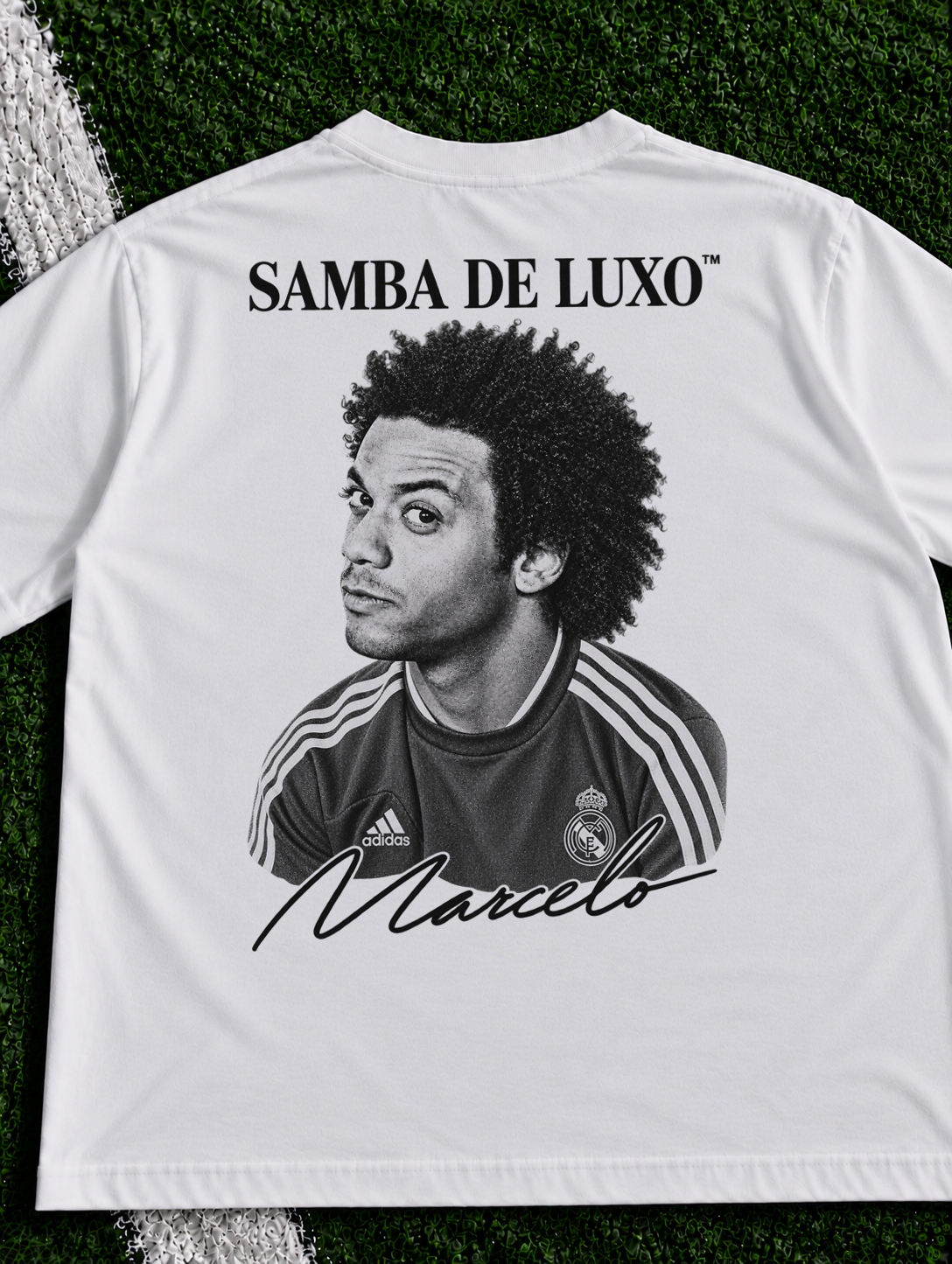 Marcelo Samba de Luxo organic heavy graphic T-shirt on football pitch zoomed in