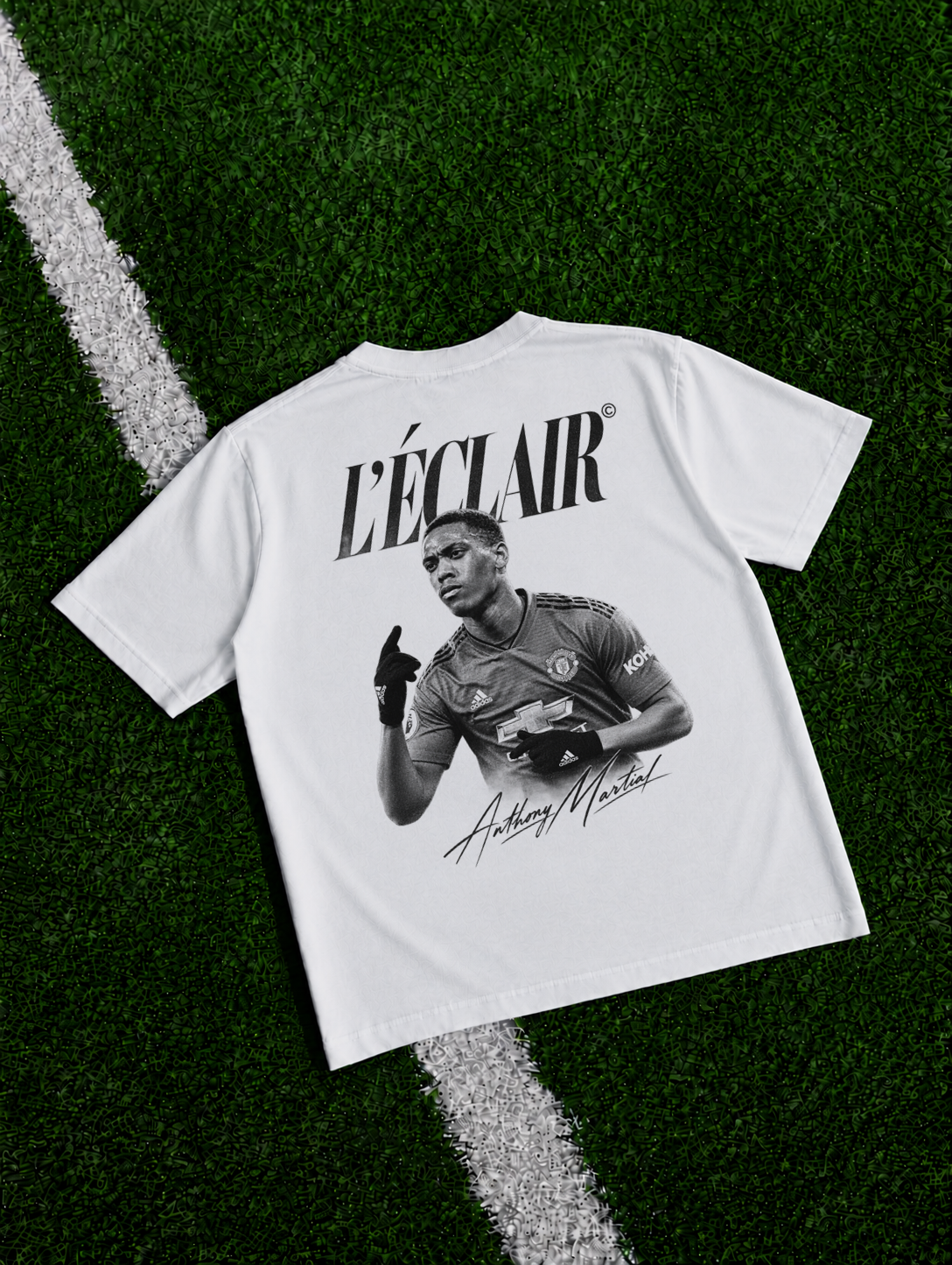 Anthony Martial L'Eclair organic heavy graphic T-shirt on football pitch