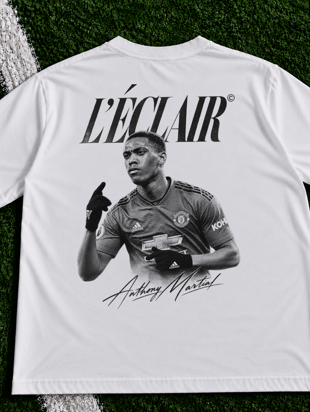 Anthony Martial L'Eclair organic heavy graphic T-shirt on football pitch zoomed in